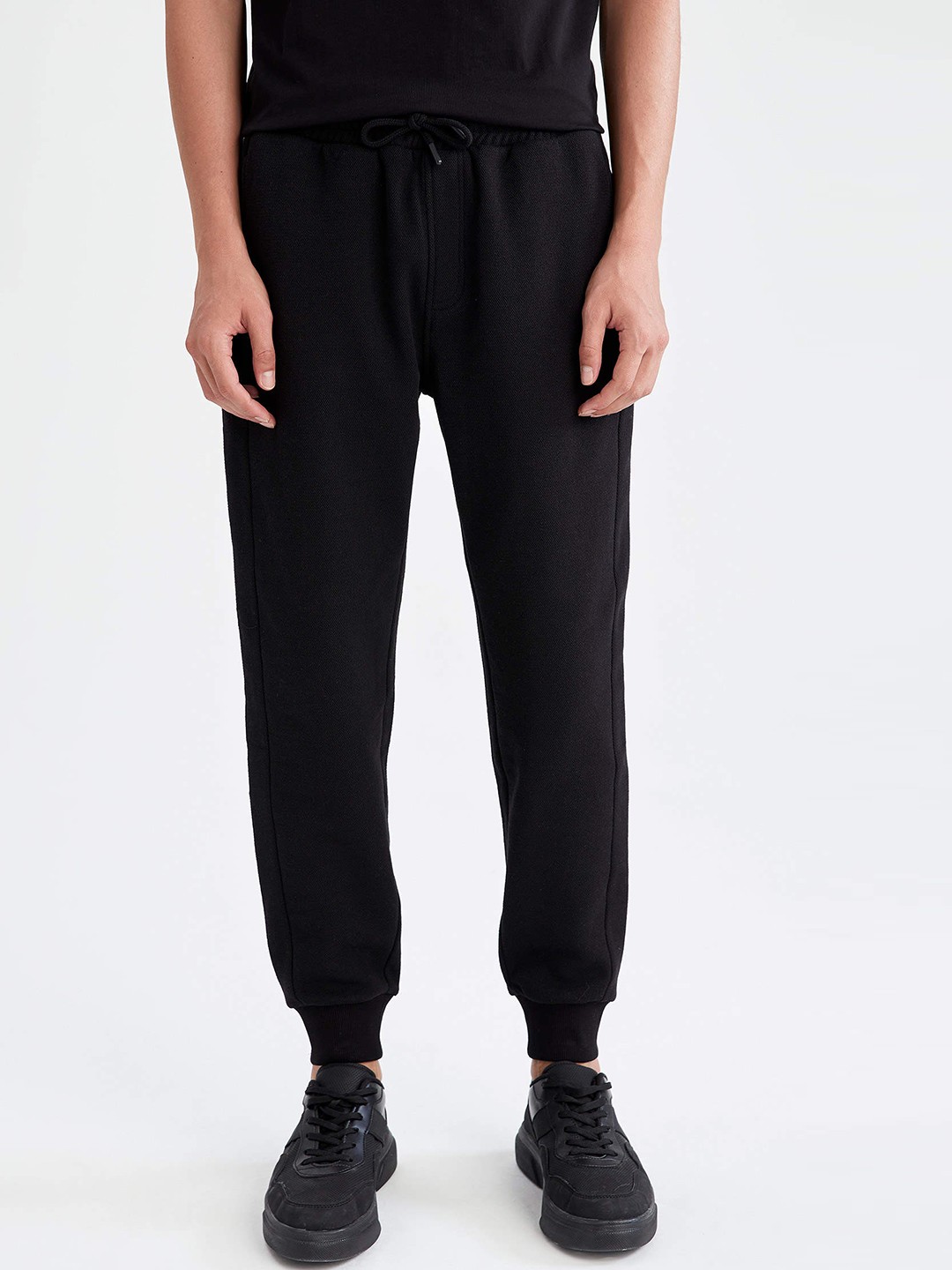 

DeFacto Men Black Solid Joggers