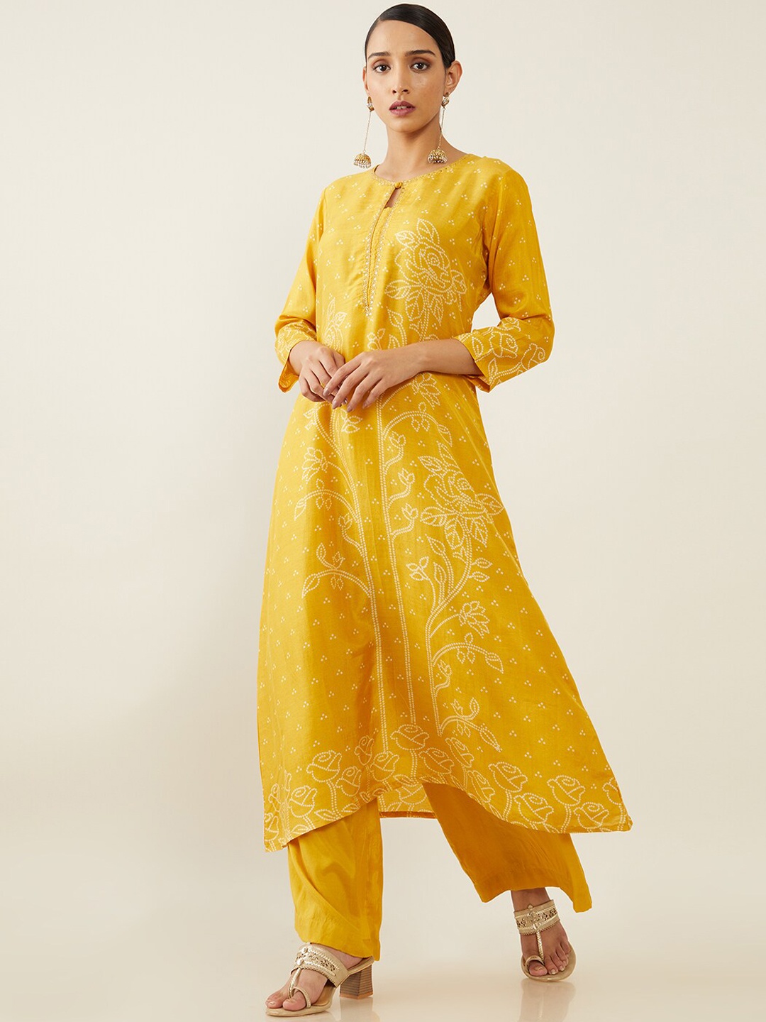 

Soch Women Mustard Yellow & White Floral Printed A-Line Kurta With Trousers