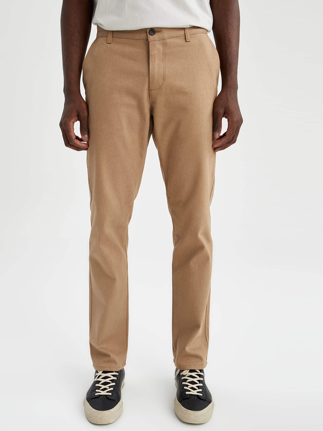 

DeFacto Men Beige Solid Trousers