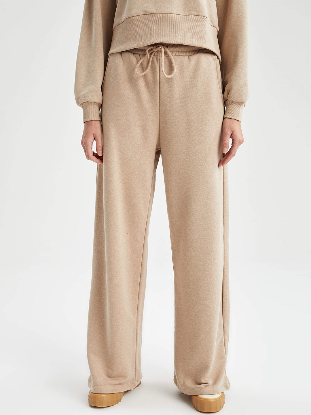 

DeFacto Women Beige Solid Track Pants