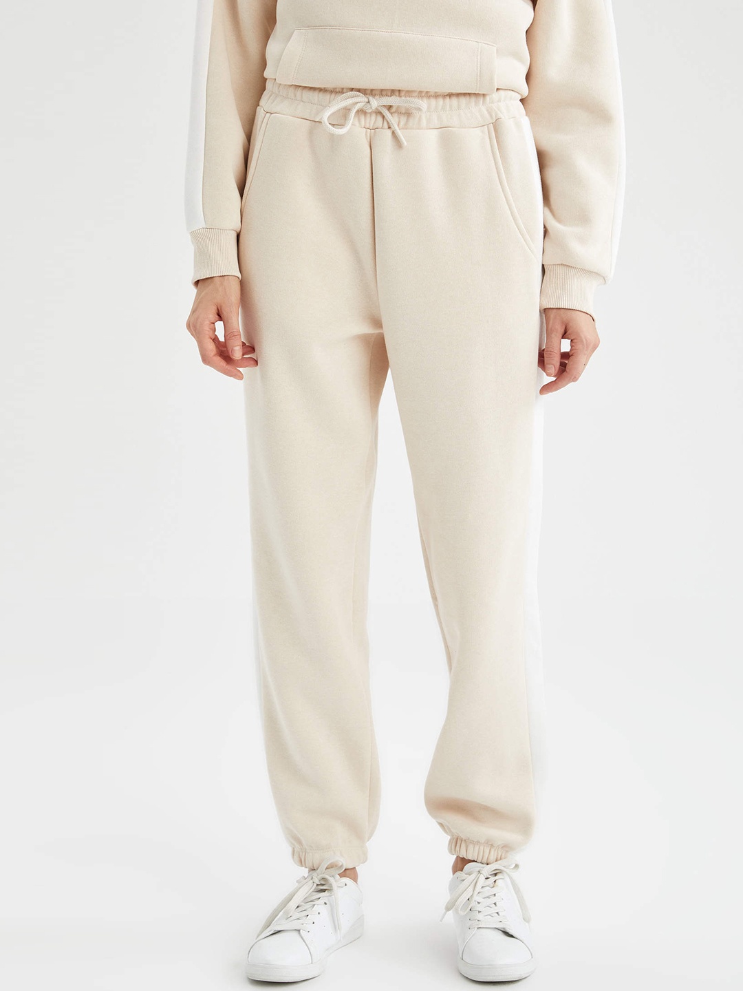 

DeFacto Women Off-White Solid Joggers