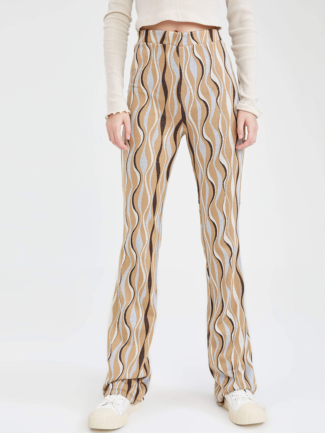 

DeFacto Women Beige & White Wave Print Trousers