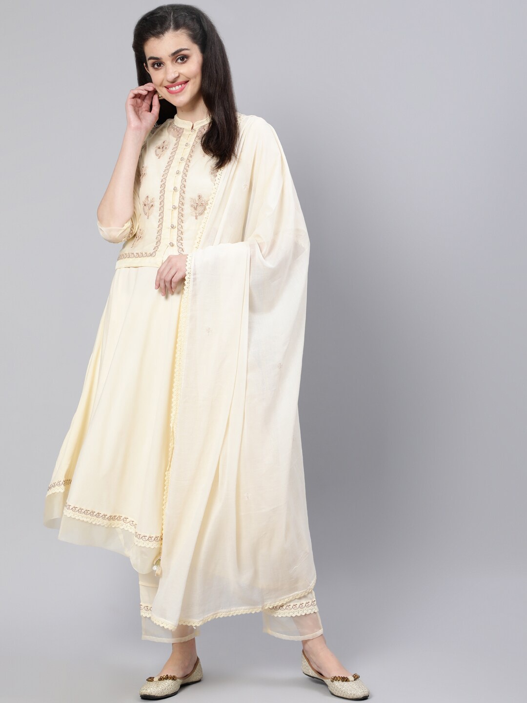 

Nayo Women Cream-Coloured Floral Embroidered Empire Thread Work Kurta with Trousers