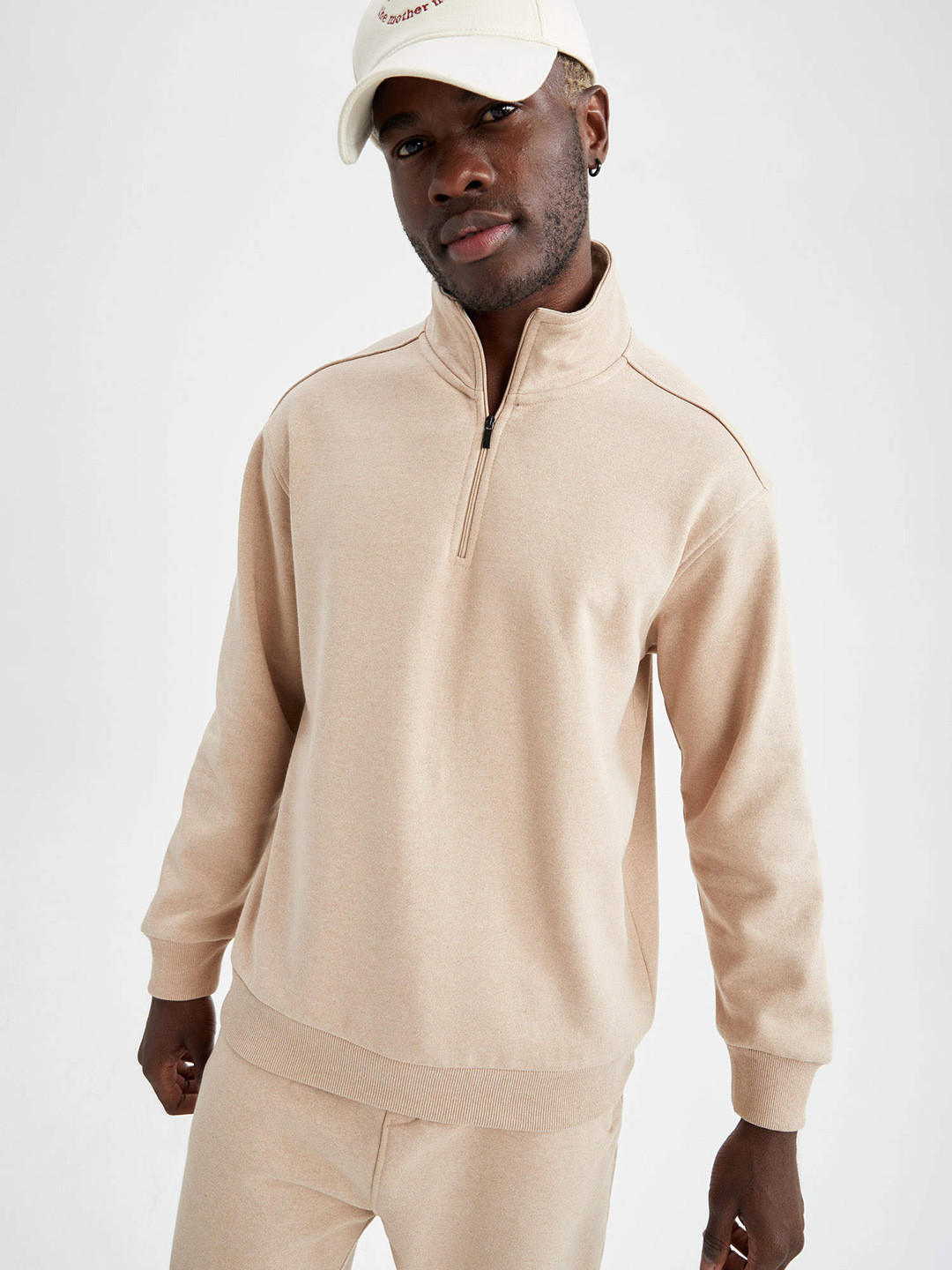 

DeFacto Men Beige Solid Sweatshirt