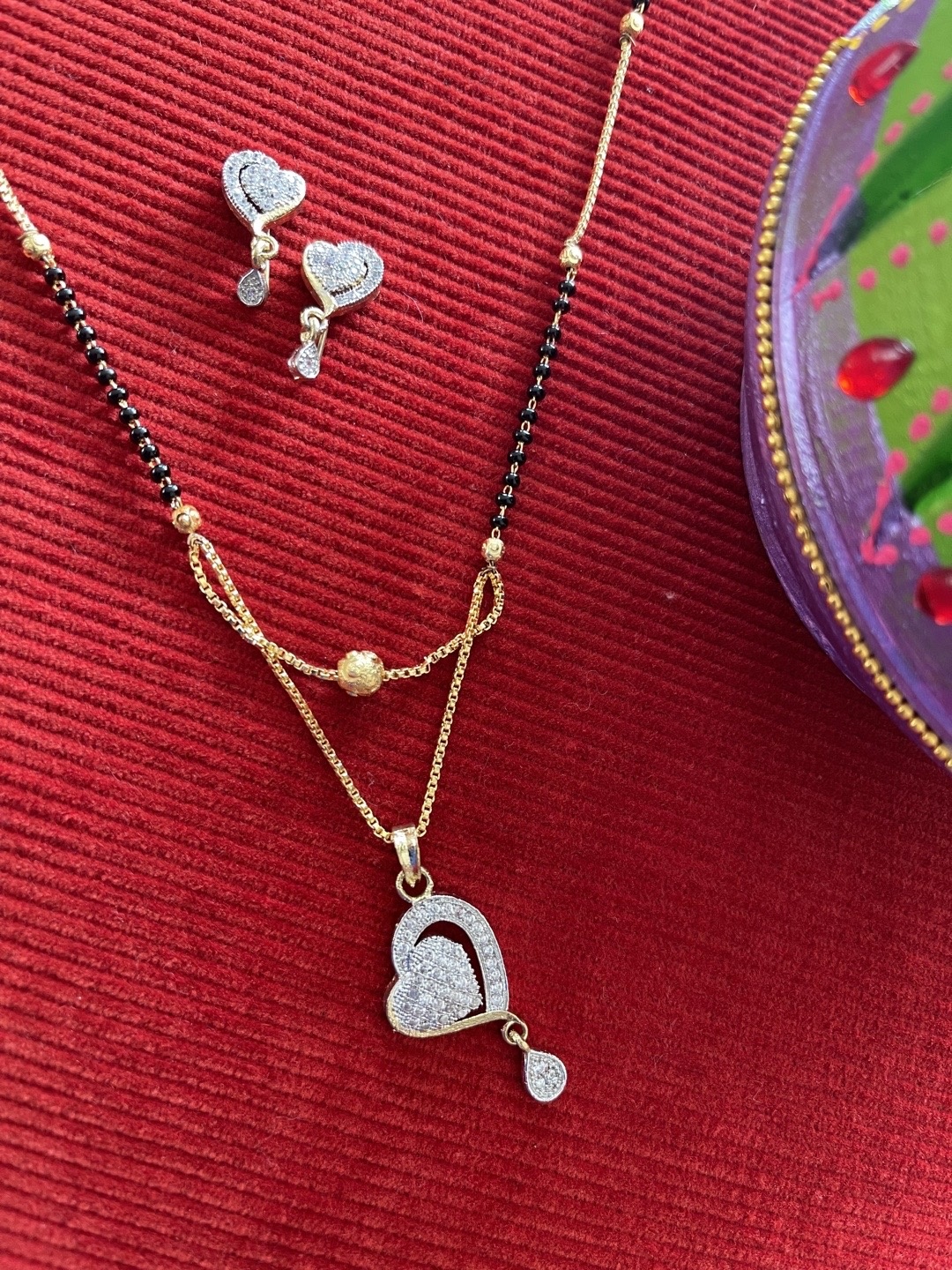 

Digital Dress Room Gold-Plated White & Black Studded & Beaded Mangalsutra