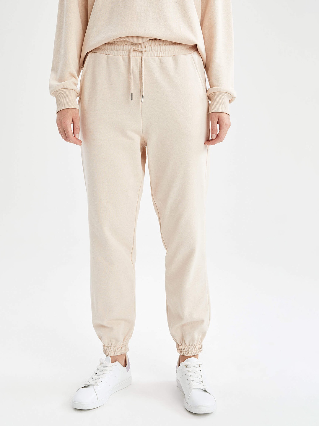 

DeFacto Women Beige Solid Joggers