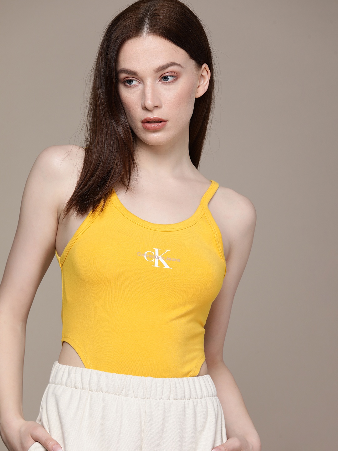 

Calvin Klein Jeans Women Yellow Printed Slim Fit HIGH LEG BODY T-shirt