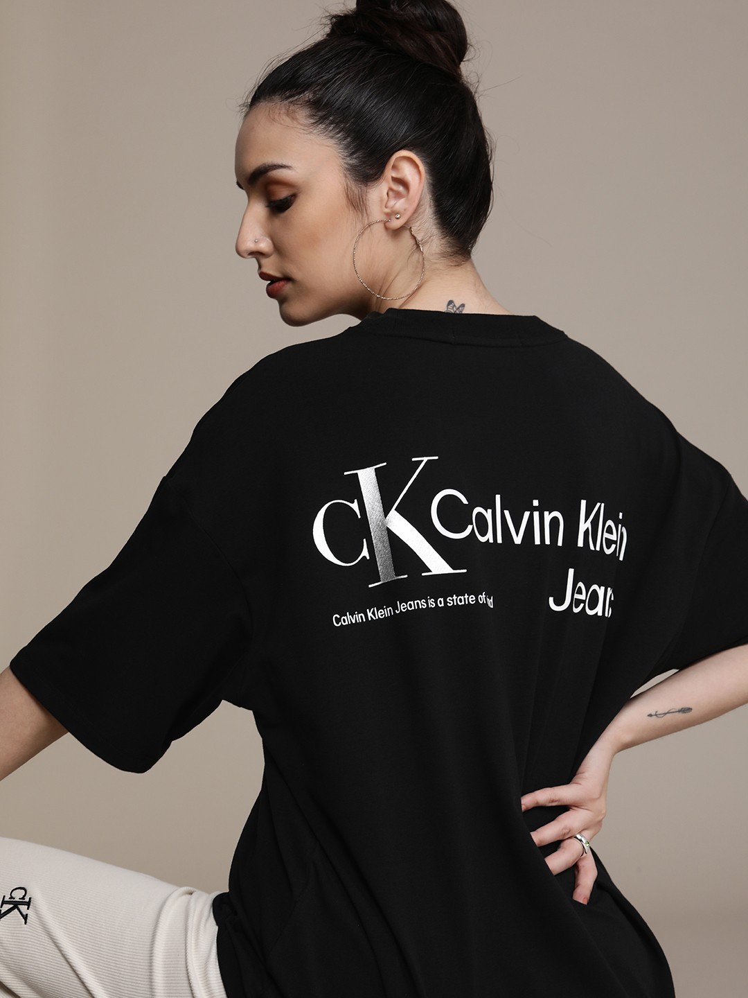 

Calvin Klein Jeans Women Black Brand Logo Printed T-shirt