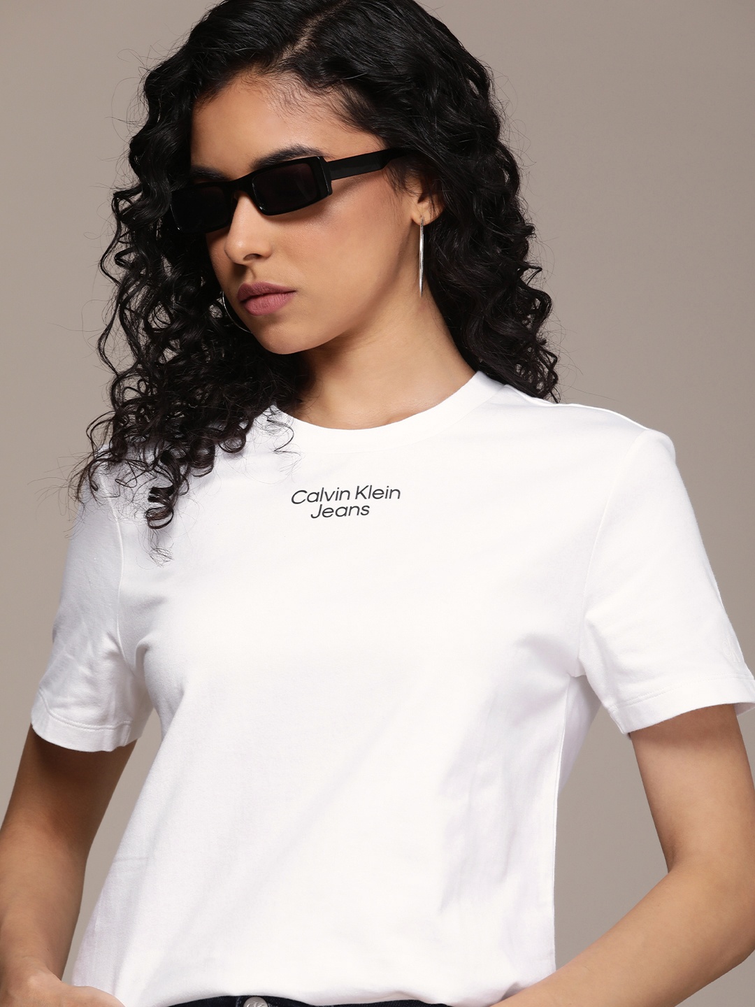 

Calvin Klein Jeans Women Pure Cotton Solid Round Neck T-shirt With Brand Logo Detail, White