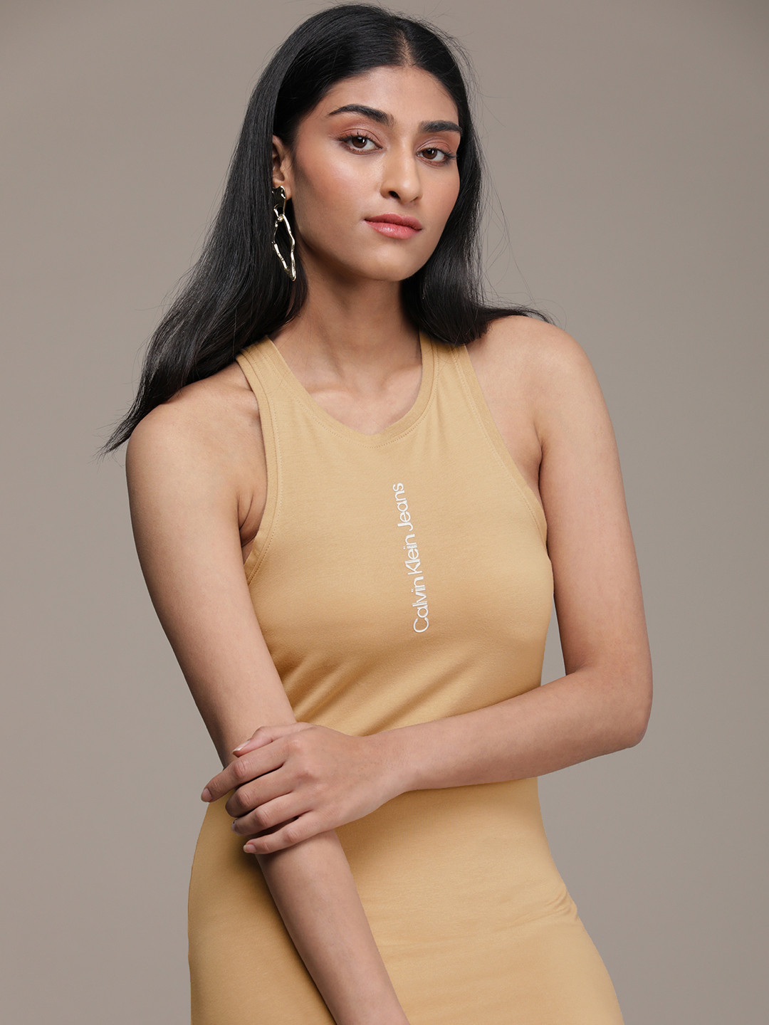 

Calvin Klein Jeans Camel Brown Solid Round Neck Brand Logo Applique Knitted Sheath Dress