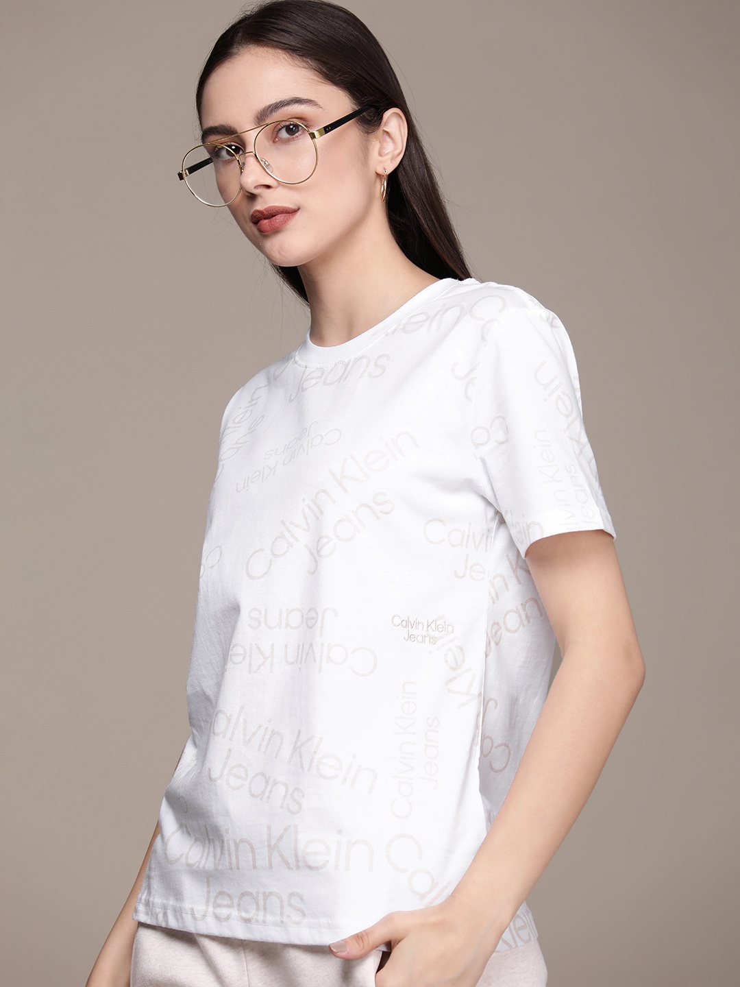 

Calvin Klein Jeans Women White & Beige Brand Logo Printed Pure Cotton T-shirt