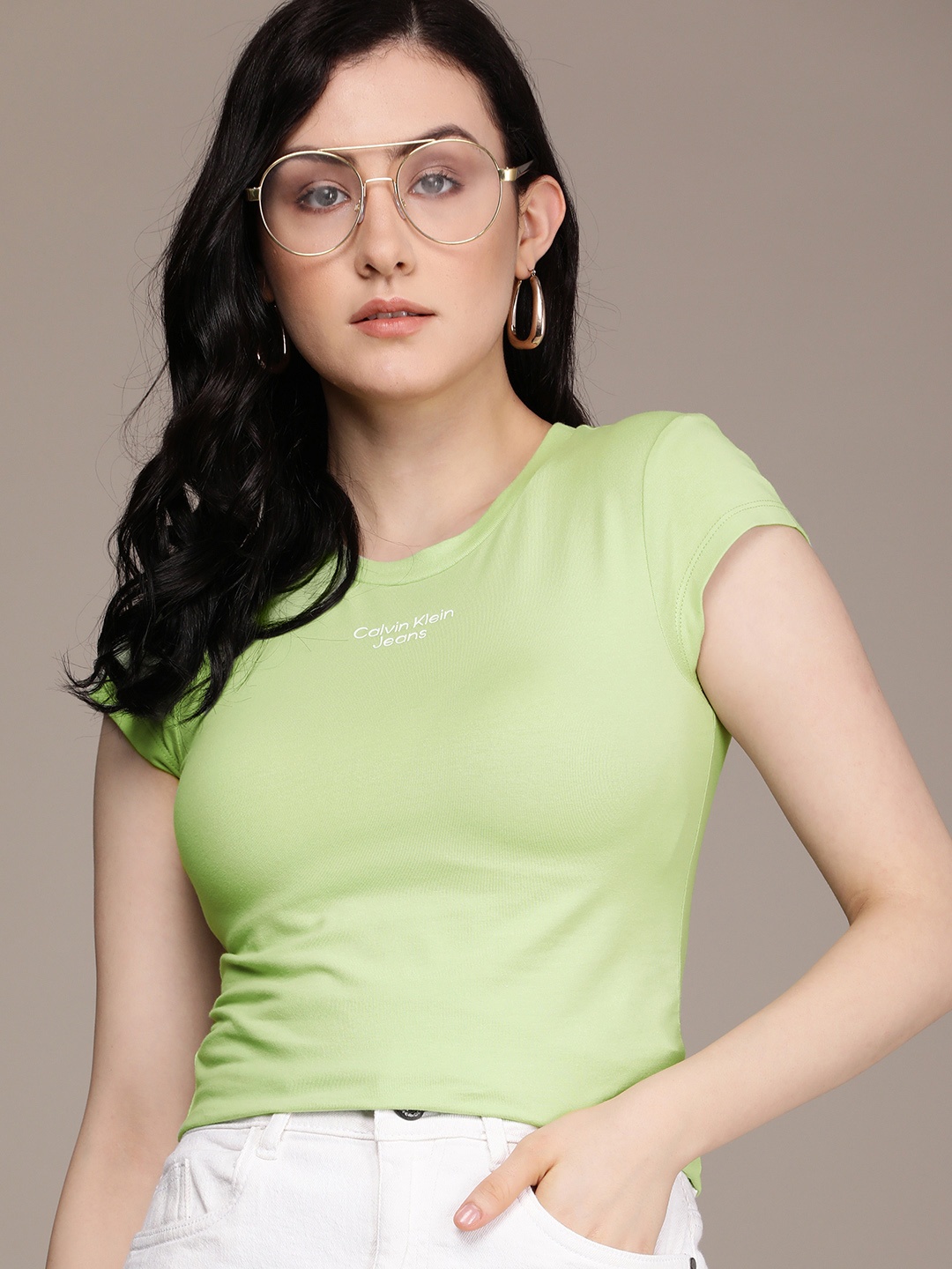 

Calvin Klein Jeans Women Green & White Printed Slim Fit T-shirt