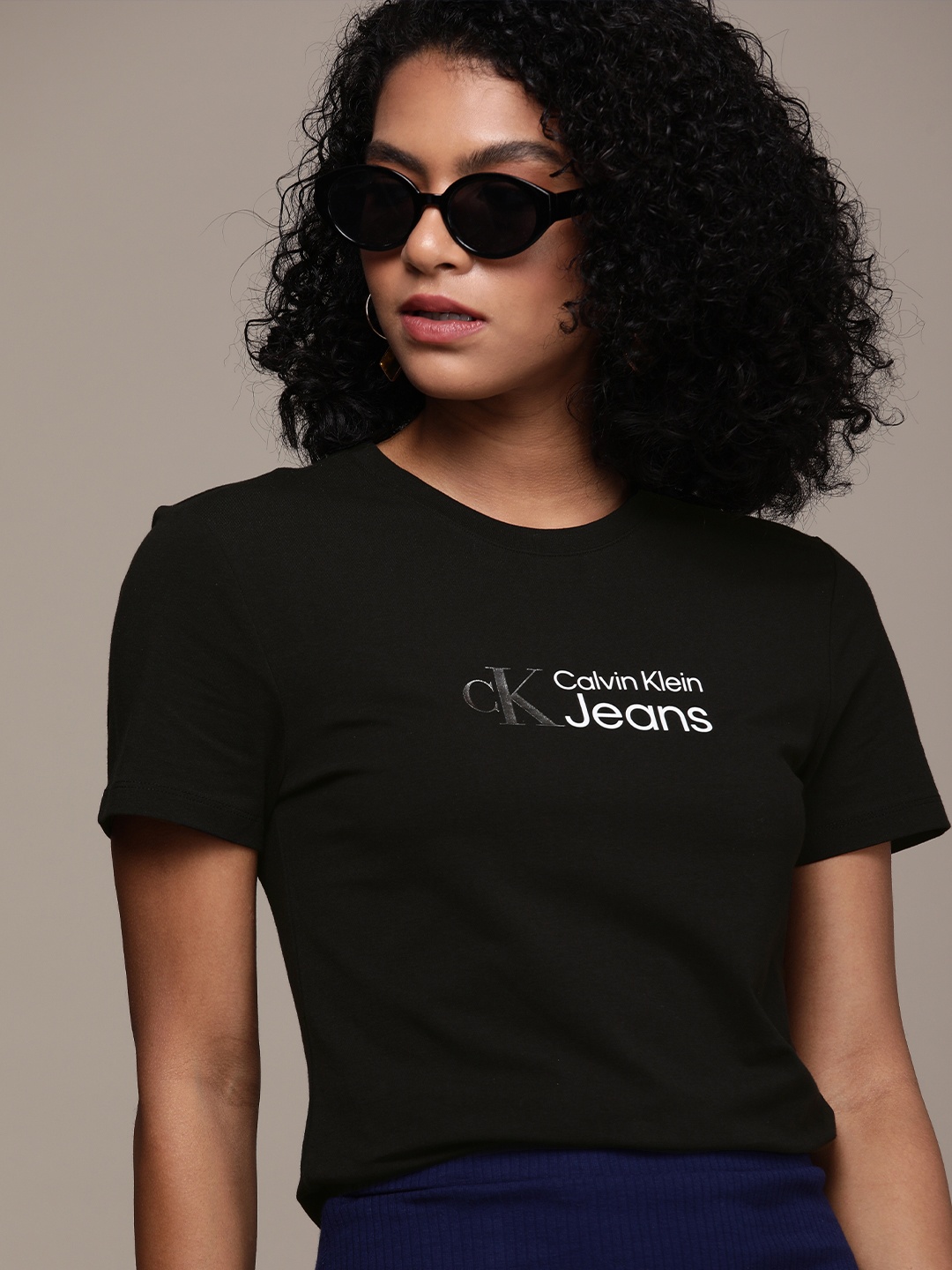 

Calvin Klein Jeans Women Black & White Printed Slim Fit T-shirt