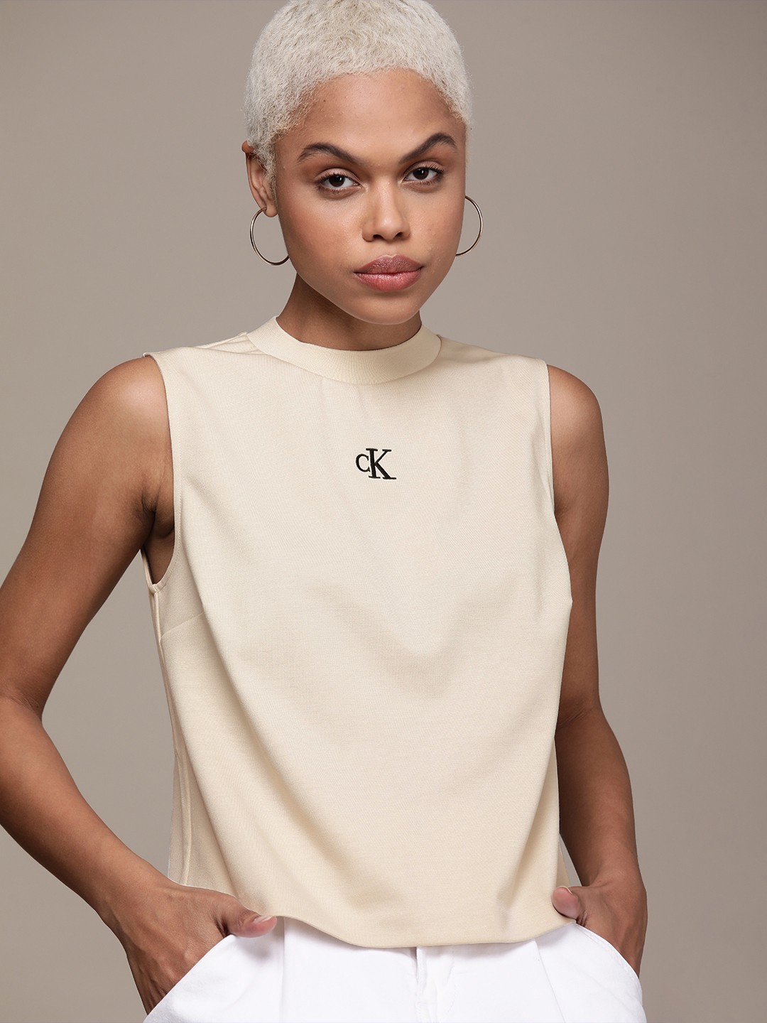 

Calvin Klein Jeans Women Beige Brand Logo Printed Sleeveless T-shirt