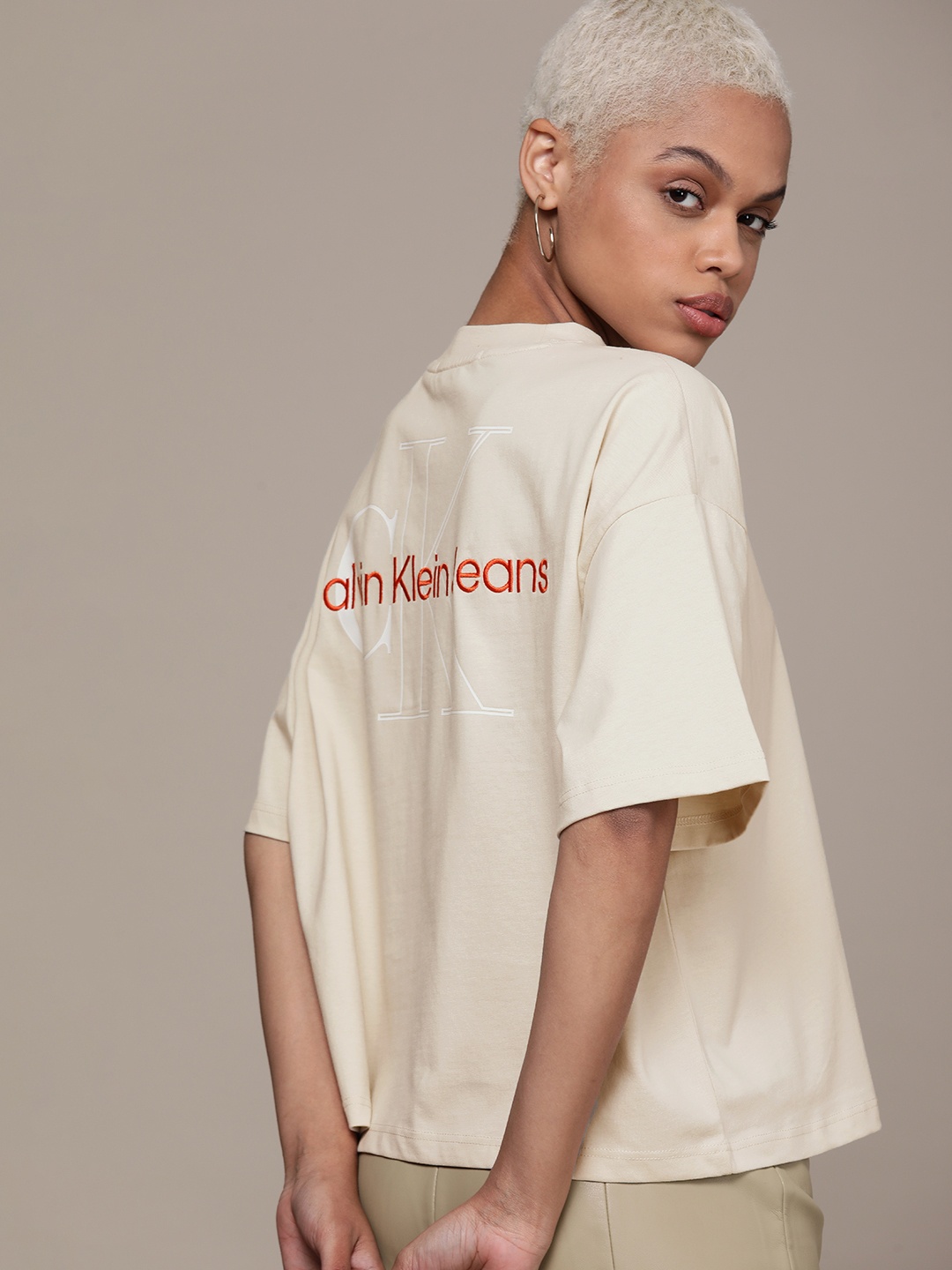 

Calvin Klein Jeans Women Beige Brand Logo Printed Pure Cotton Loose T-shirt