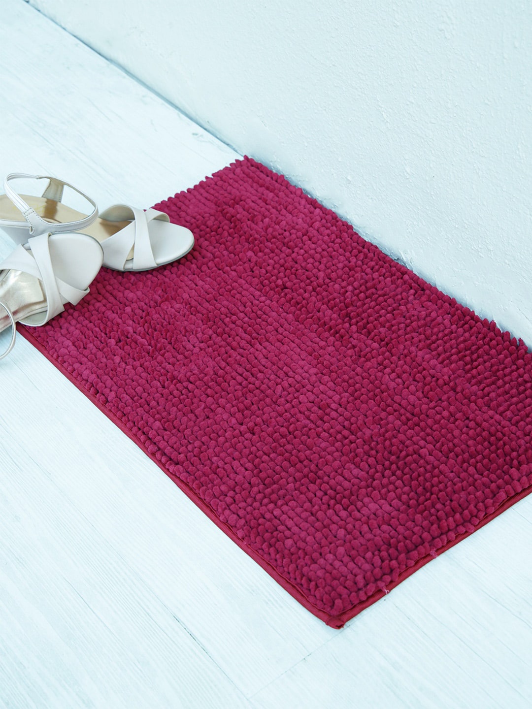 

Ariana Magenta Self Design Micro Plush Door Mat