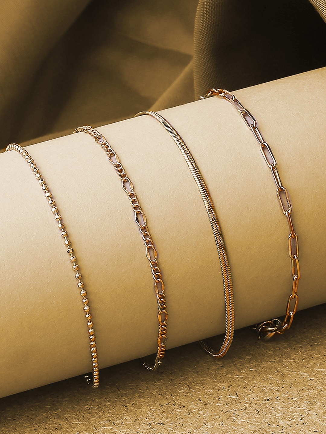 

OOMPH Women 4 Gold-Toned Charm Bracelets