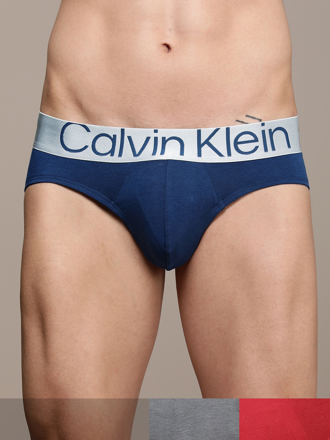 

Calvin Klein Underwear Men Pack of 3 Solid Hipster Briefs NB3129109, Red