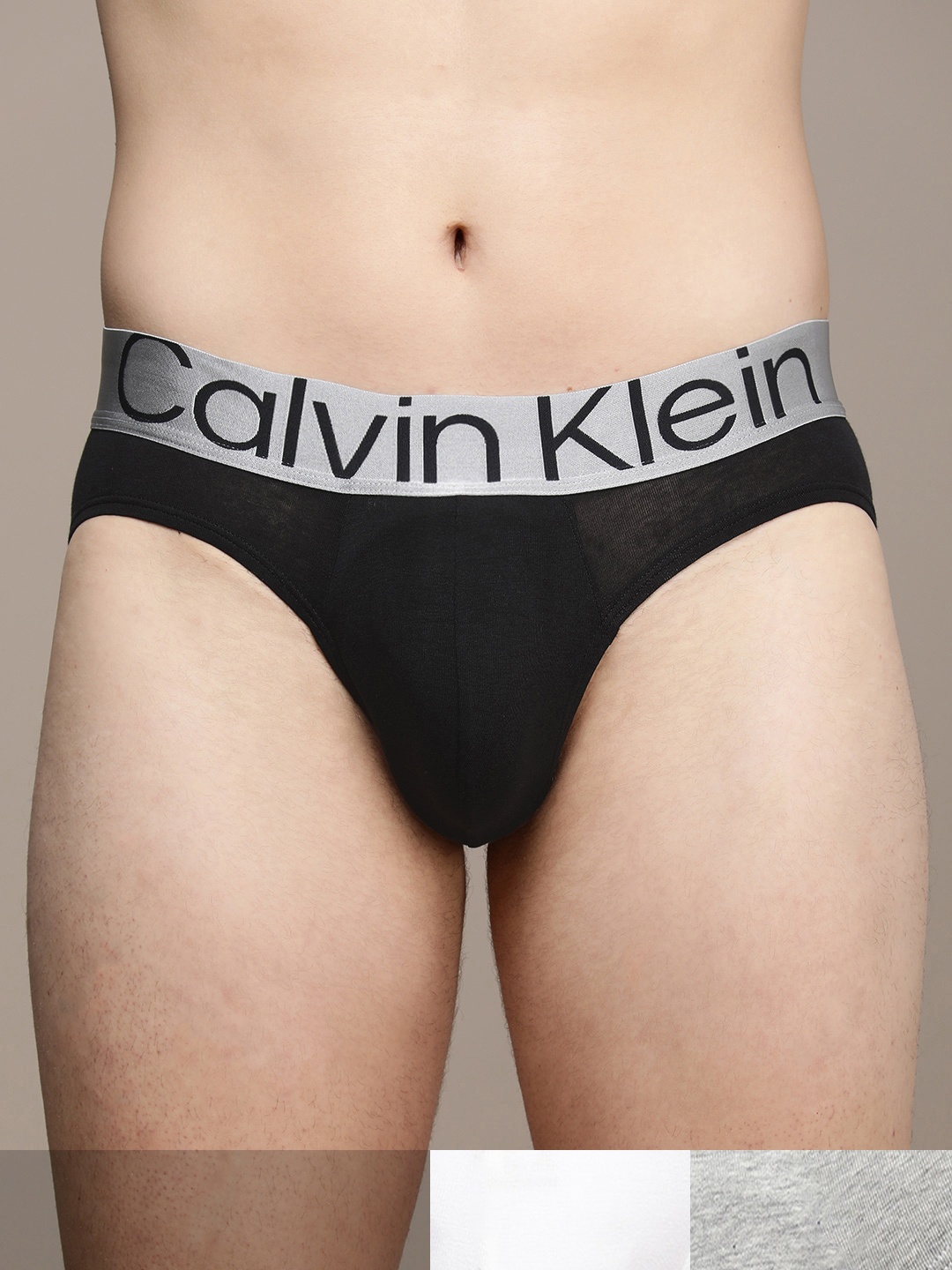 

Calvin Klein Underwear Men Pack of 3 Solid Hipster Briefs NB3129MPI, Grey melange