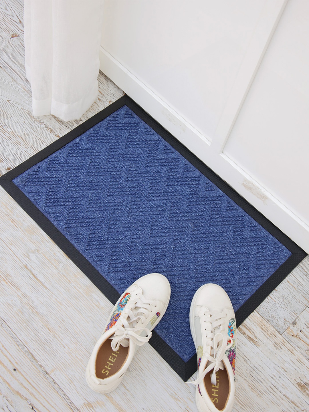 

Ariana Blue Self-Design Anti-Skid Doormat