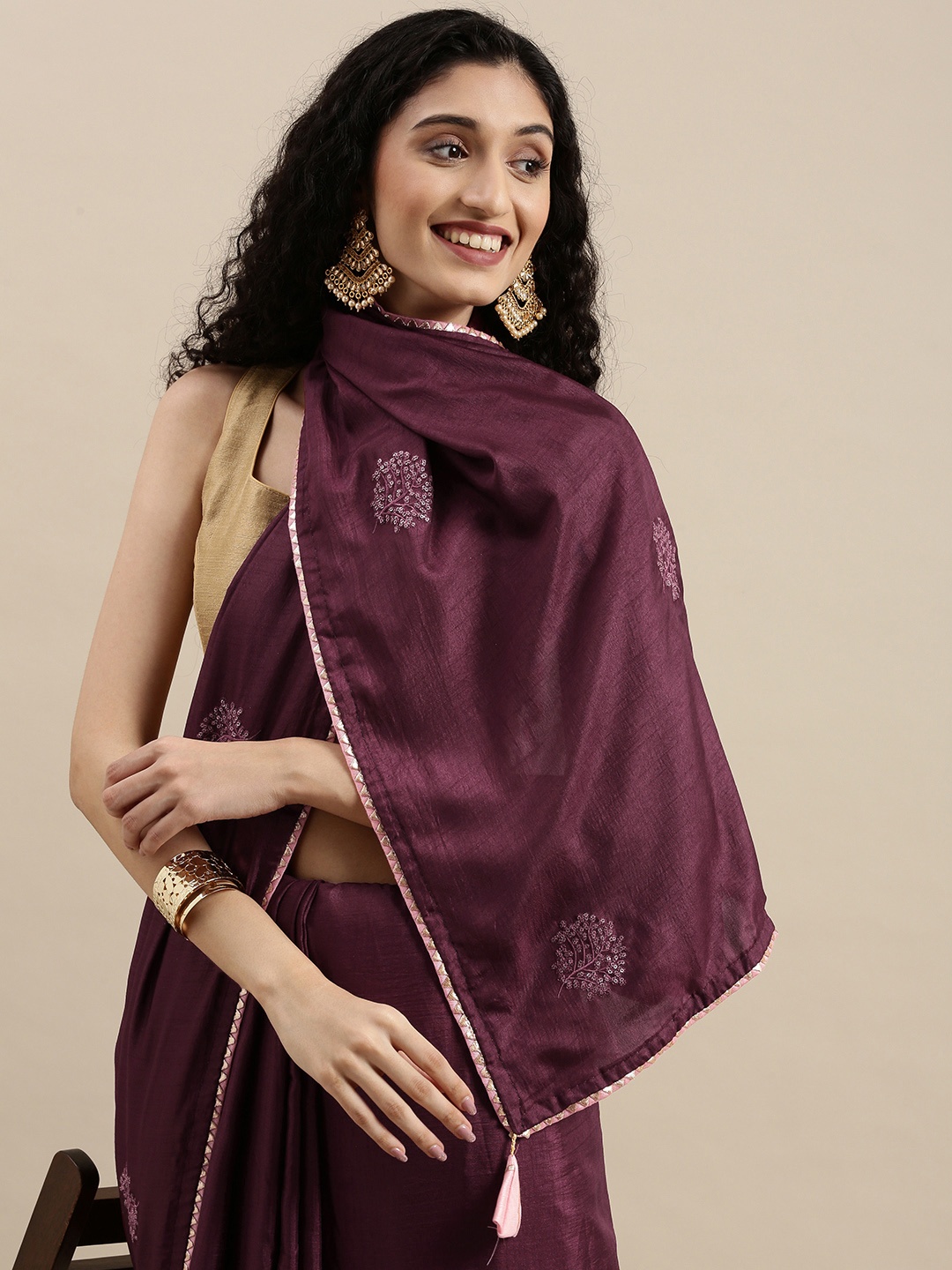 

Mitera Maroon Ethnic Motifs Sequinned Silk Blend Saree with Contrast Blouse Piece