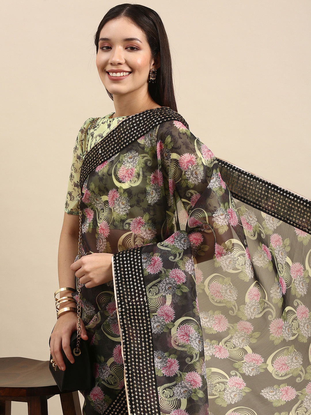 

Anouk Black & Pink Ethnic Motifs Printed Sequinned Organza Saree with Embellished Border