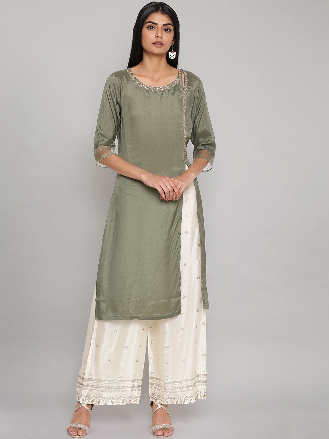 

W Women Green Floral Embroidered Pleated Kurti with Palazzos