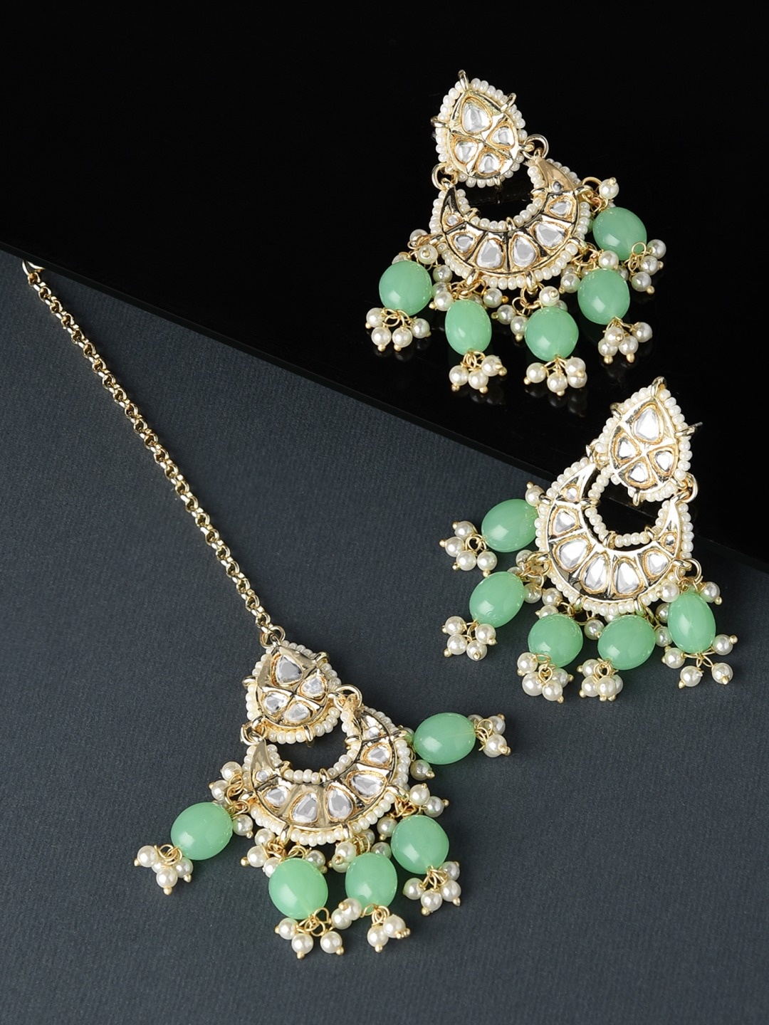 

Zaveri Pearls Gold-Plated White & Green Kundan-Studded & Beaded Jewellery Set