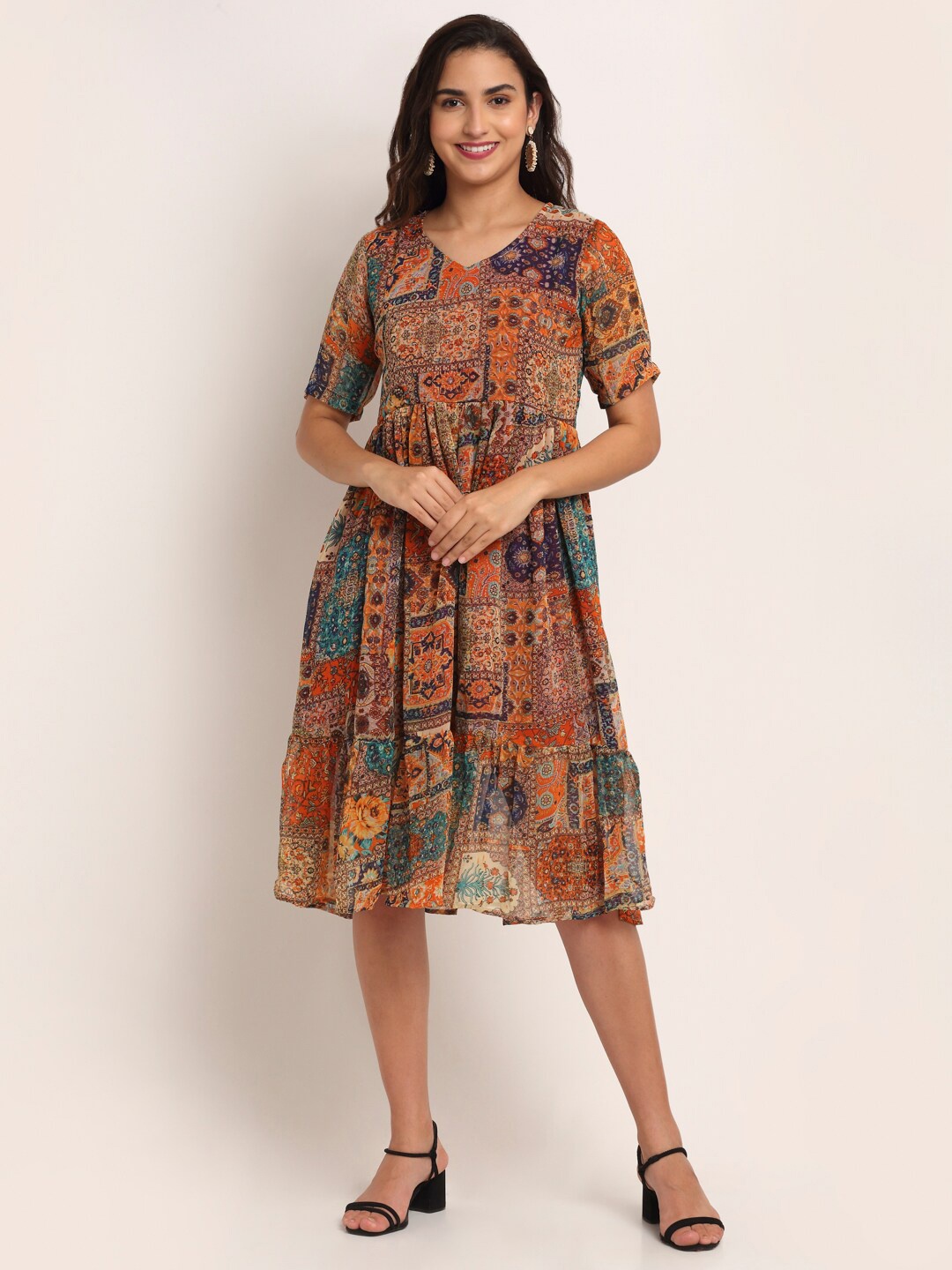 

Aawari Orange & Brown Ethnic Motifs Dress