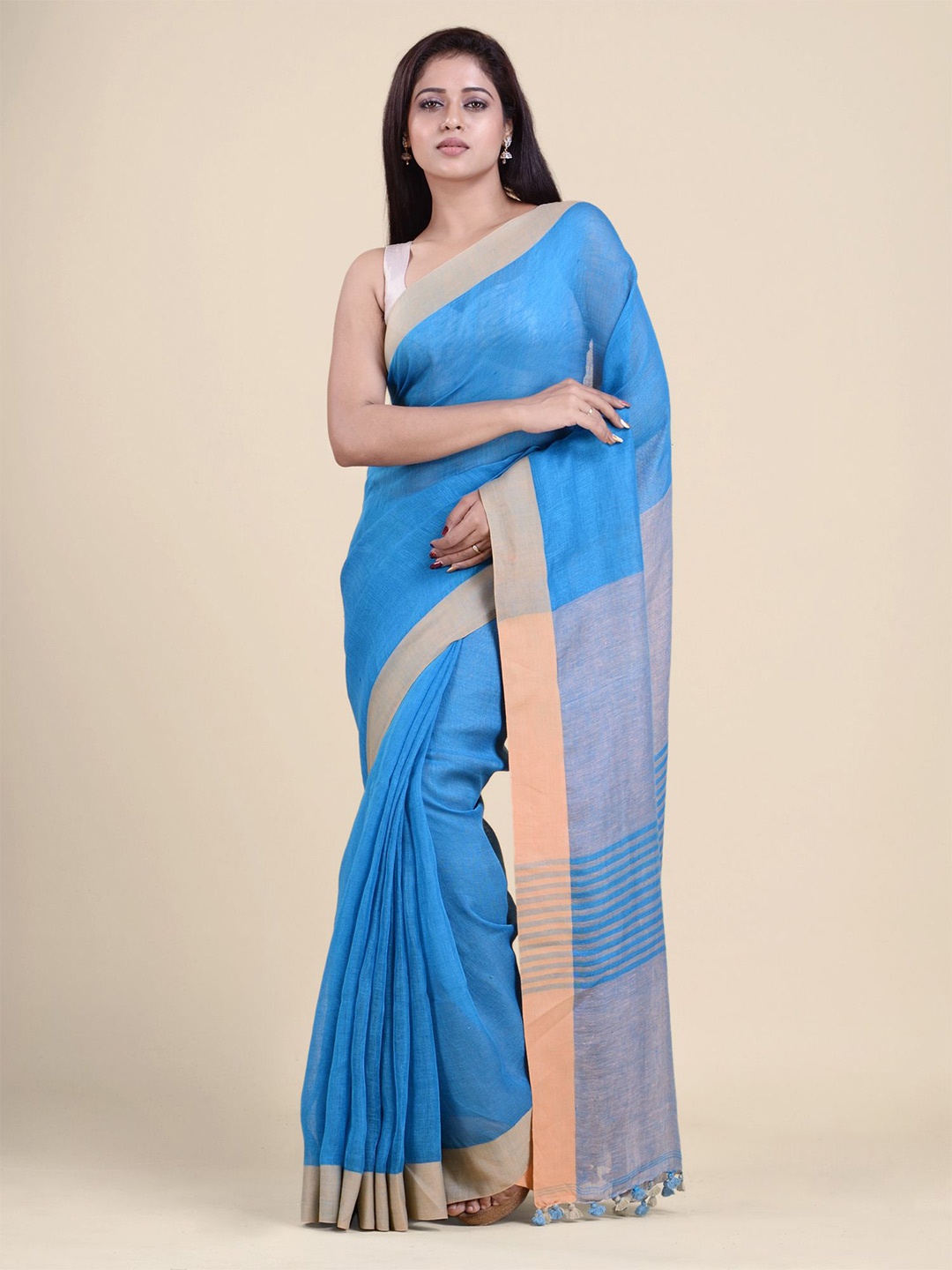 

Charukriti Blue & Beige Pure Linen Saree