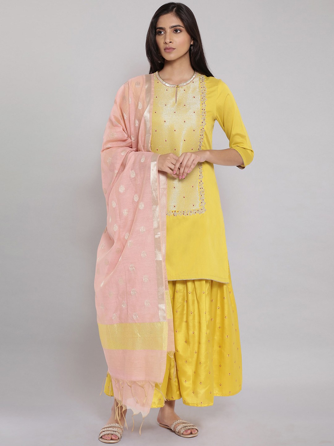 

WISHFUL Women Yellow Floral Layered Kurti with Sharara & With Dupatta