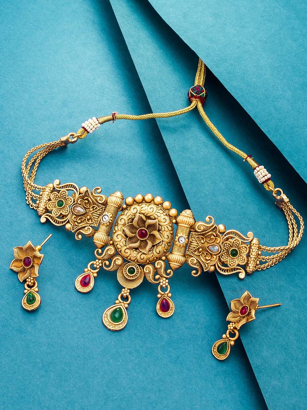 

aadita Gold Toned Pearl & Stone Studded Choker Jewellery Set