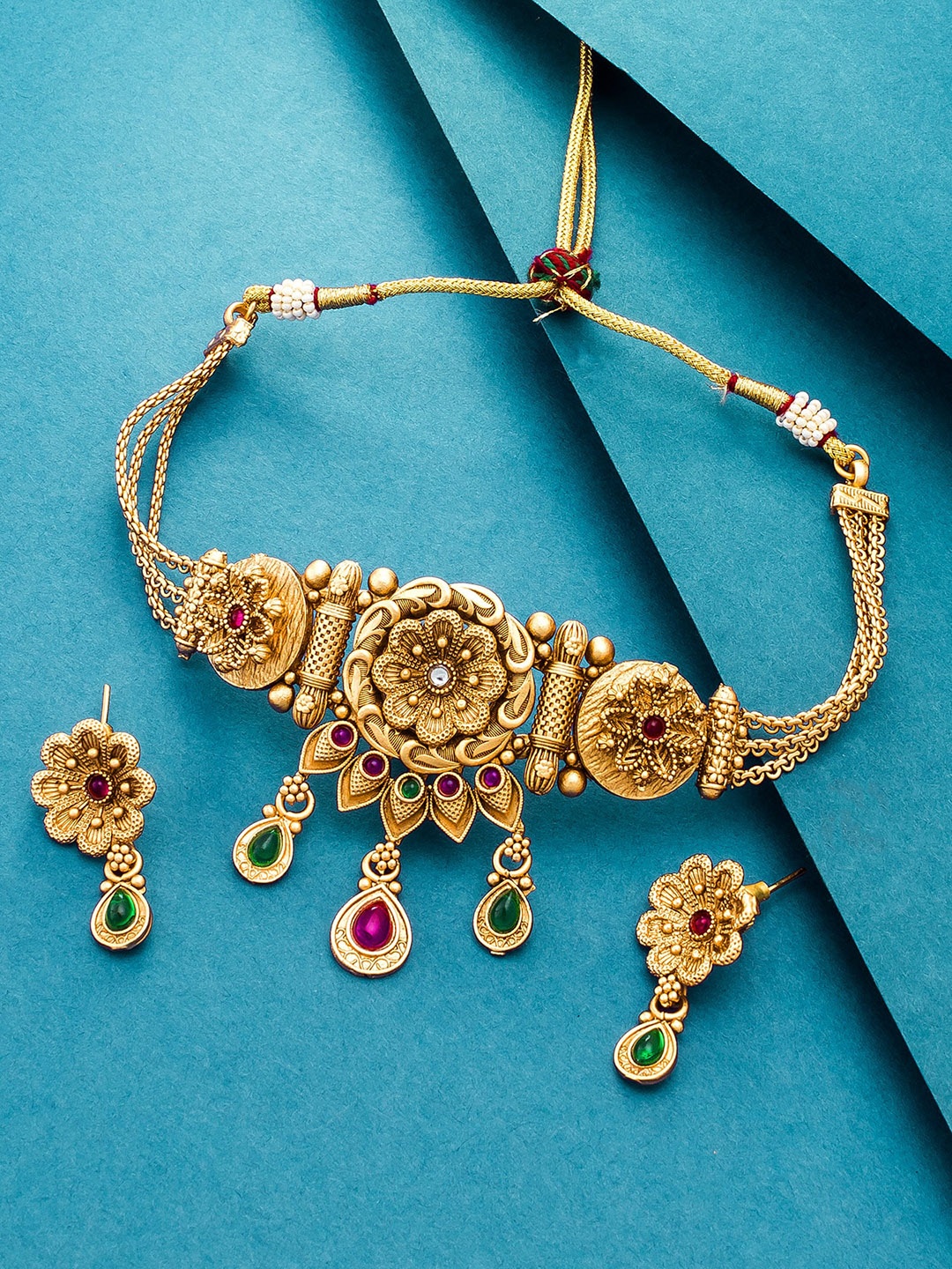

Aadita Women Gold-Toned Stone Studded Choker Jewellery Set