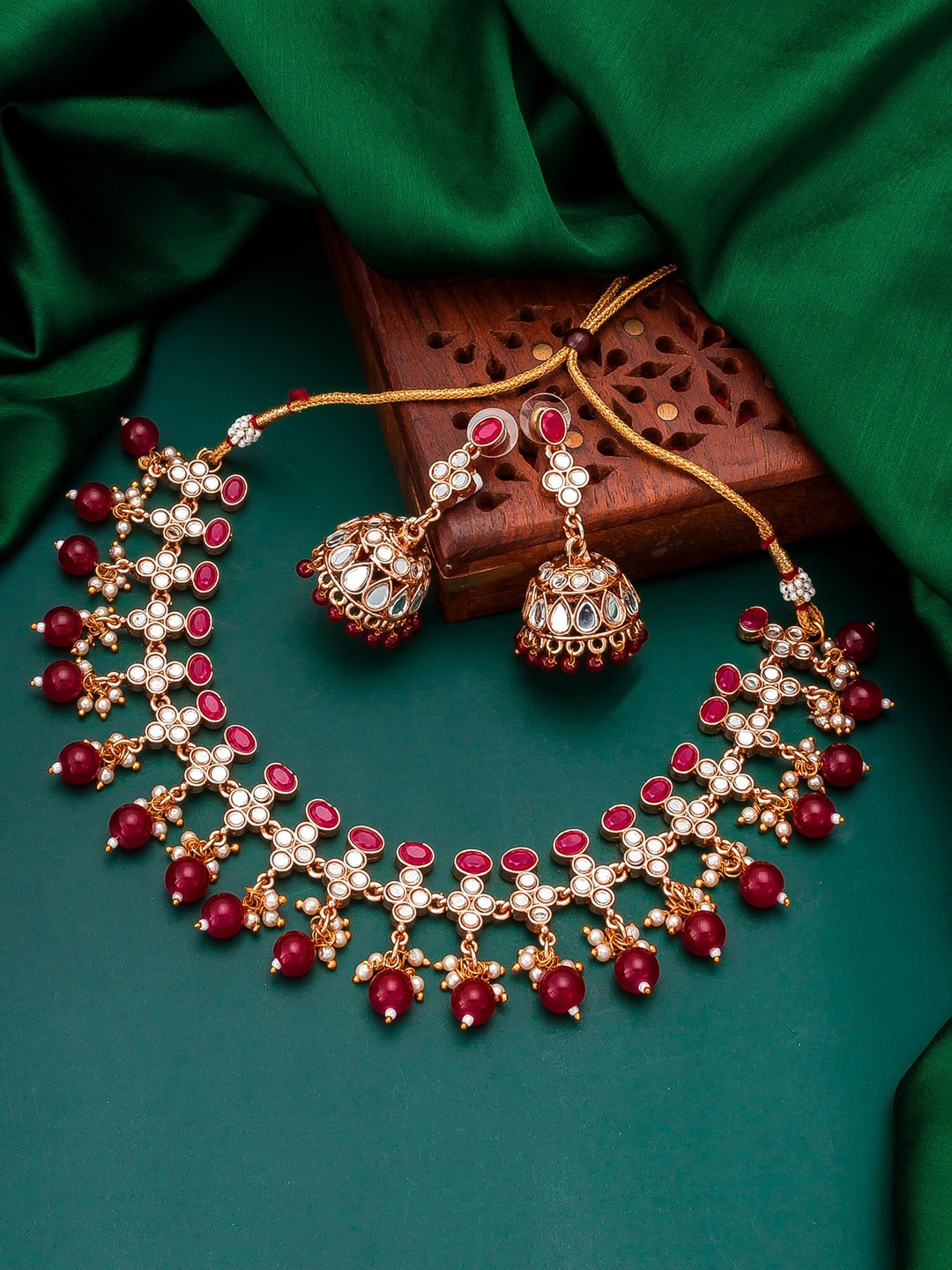 

aadita White & Red Gold-Plated Stone-Studded & Pearl Beaded Temple Jewellery Set