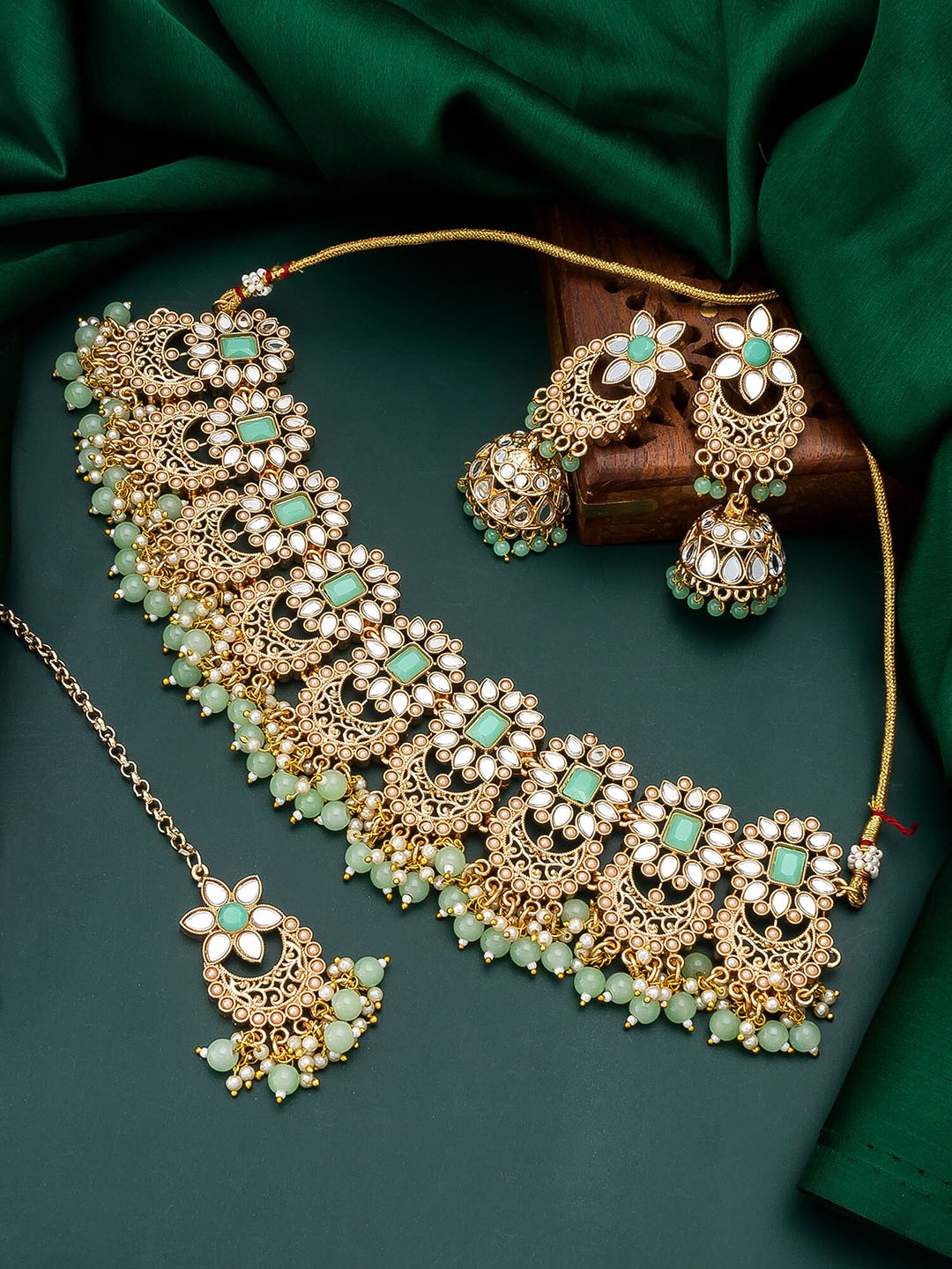 

aadita Woman Gold-Plated White & Green Stone Studded Choker Jewellery Set