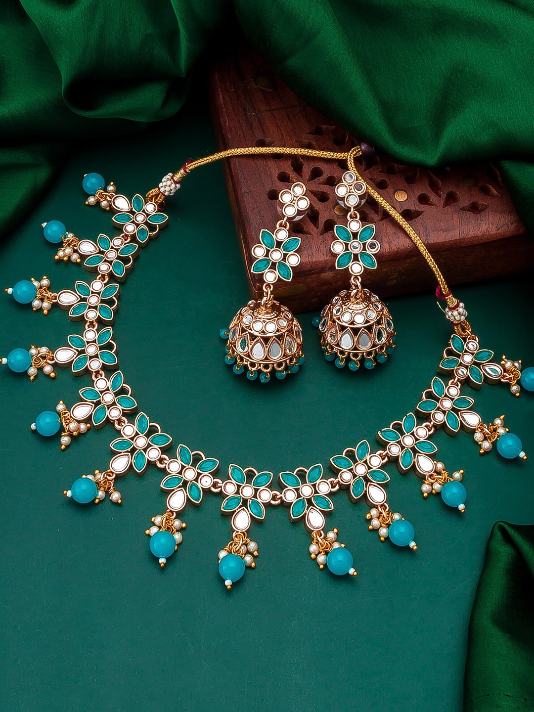 

aadita Gold Stone Studded & Pearls Beaded Temple Jewelry Set