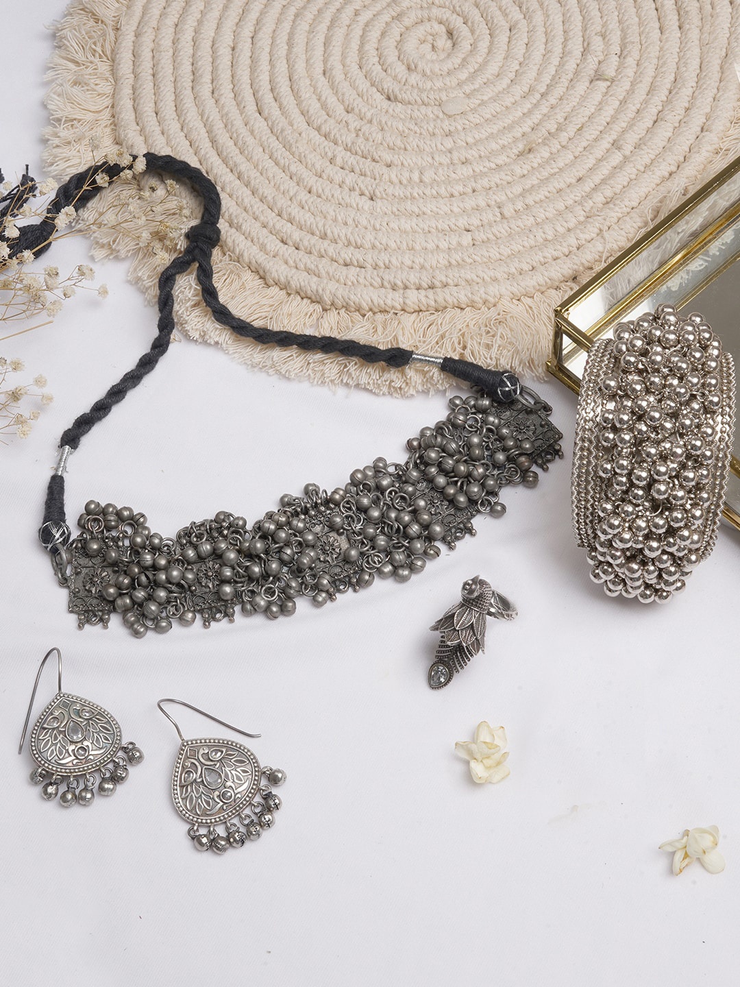 

TEEJH Silver-Toned Oxidised Ghungroo Jewellery Set