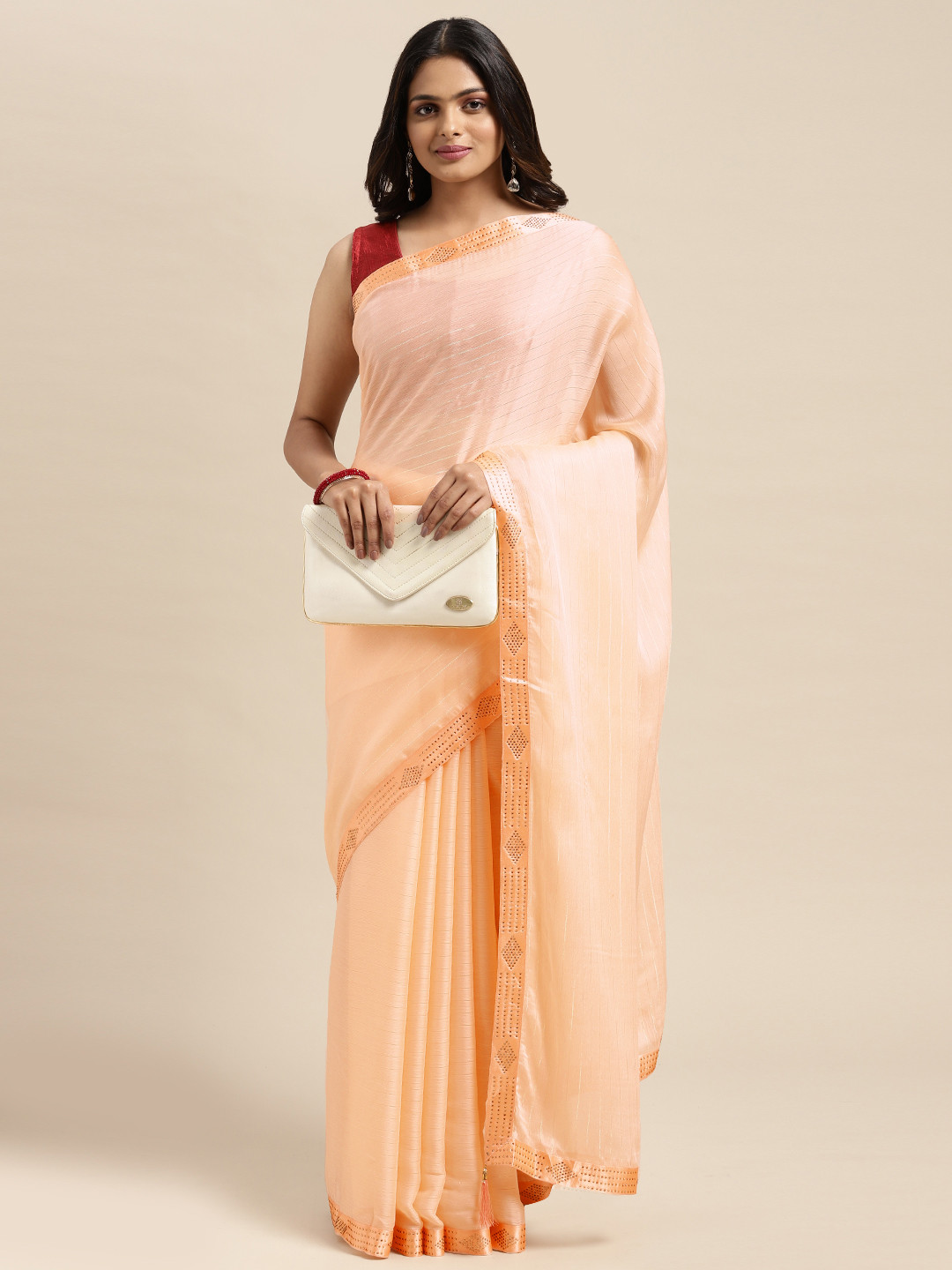 

Sugathari Peach-Coloured Embellished Beads and Stones Saree