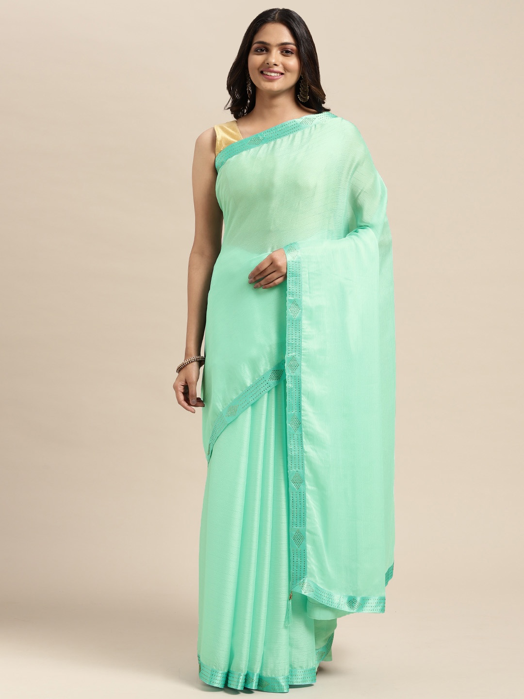 

Sugathari Turquoise Blue Embellished Beads and Stones Saree