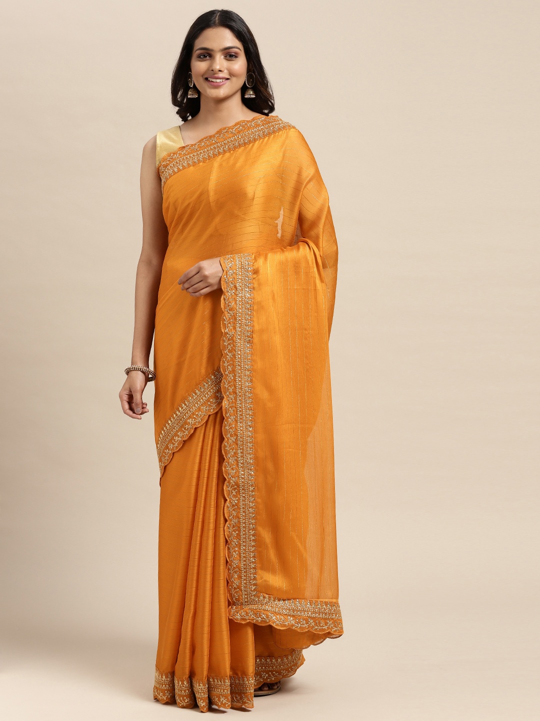 

Sugathari Mustard Embellished Embroidered Saree