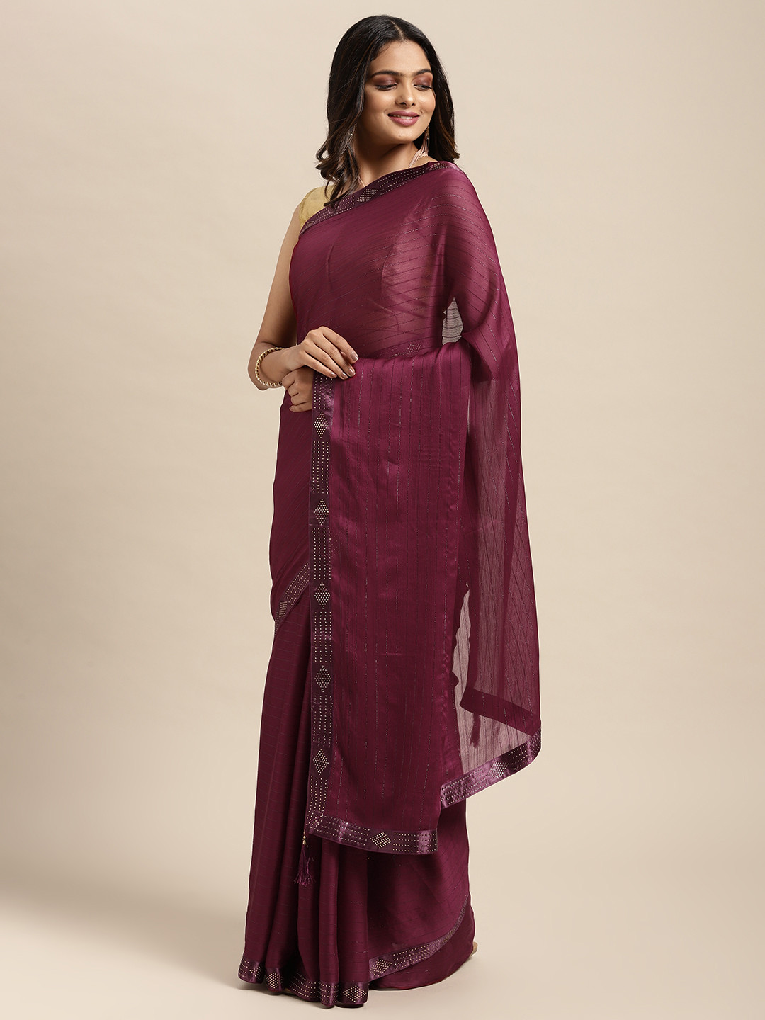 

Sugathari Purple Embellished Beads and Stones Saree