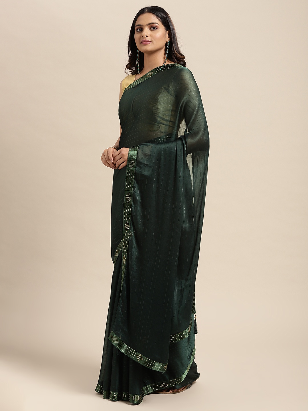 

Sugathari Green Embellished Beads and Stones Saree