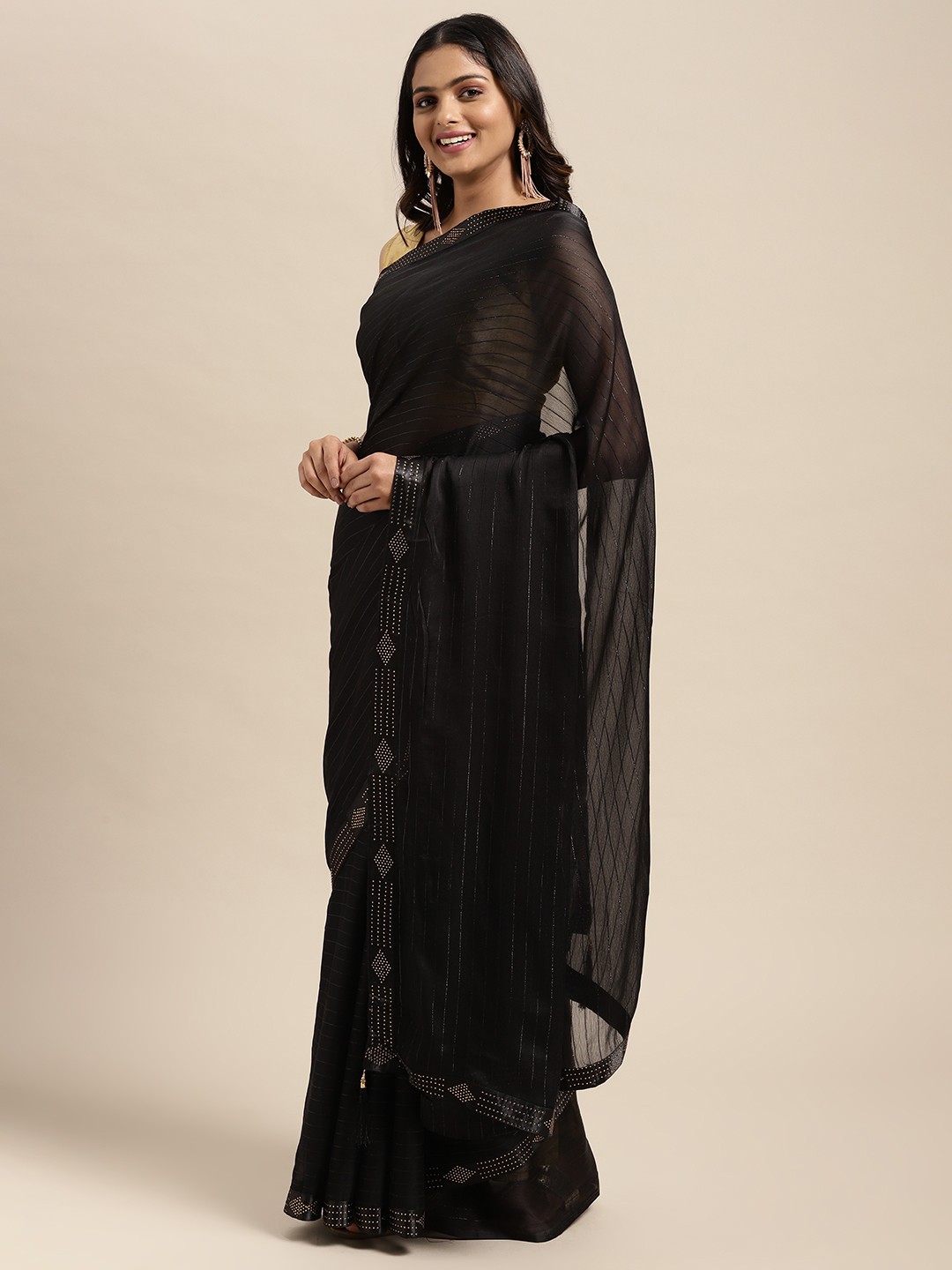 

Sugathari Black Embellished Beads and Stones Saree