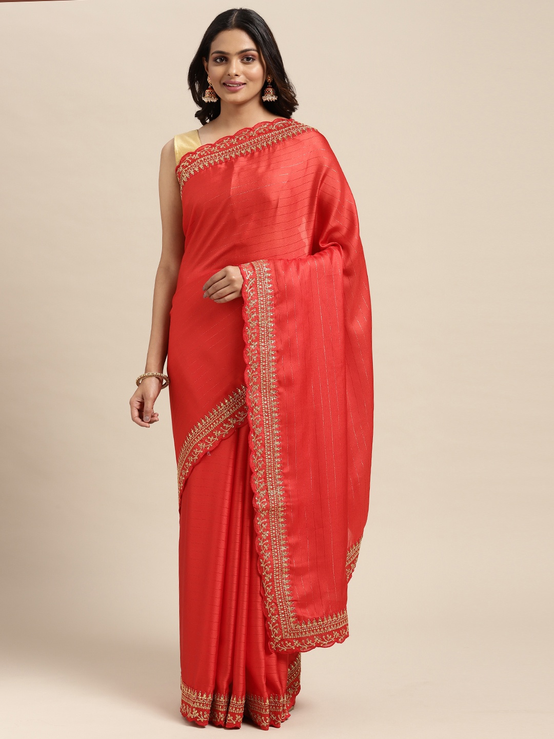 

Sugathari Red Embellished Embroidered Saree