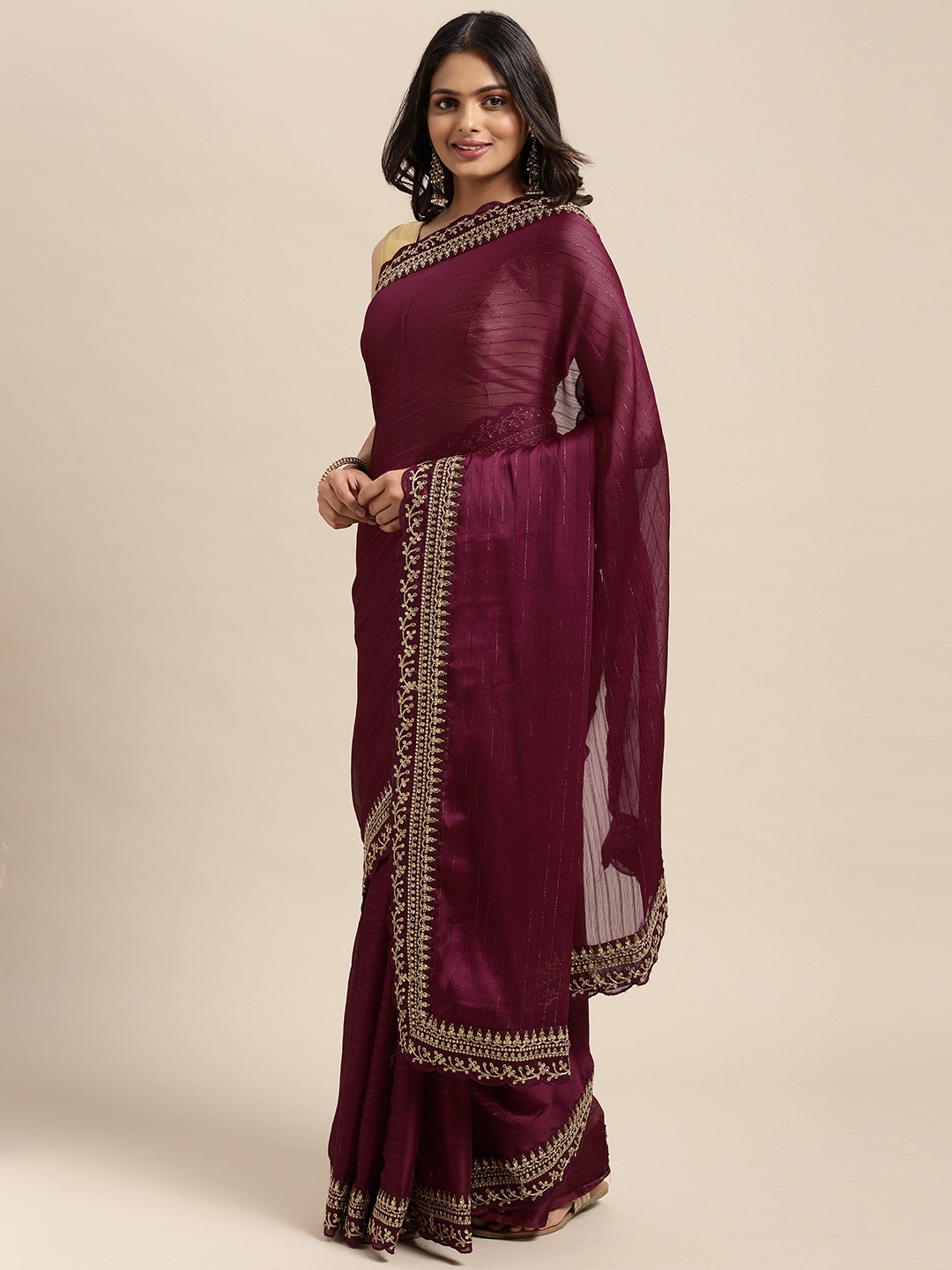 

Sugathari Purple Embellished Embroidered Saree