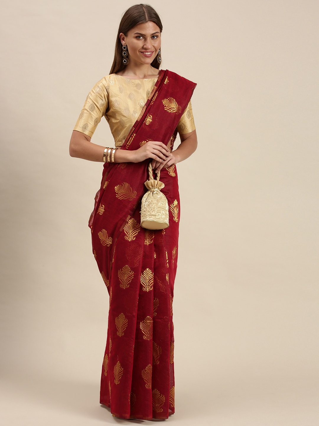 

cbazaar Maroon & Gold-Toned Ethnic Motifs Saree