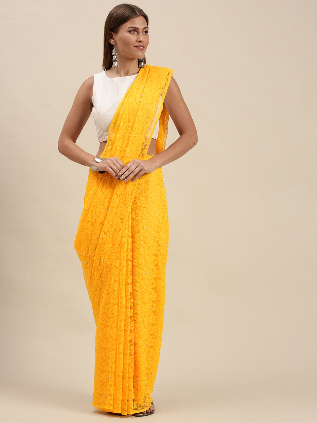 

cbazaar Yellow Ethnic Motifs Beads and Stones Art Silk Saree