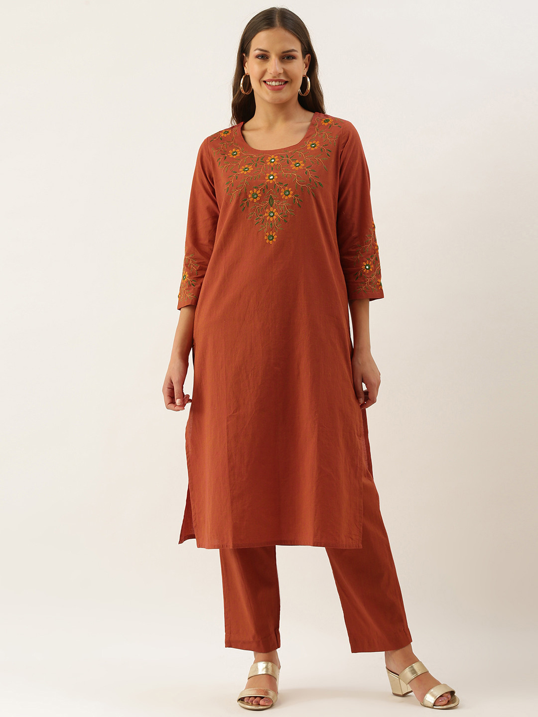 

OKHAI Women Rust Orange Yoke Design Mirror Work Pure Cotton Kurta with Trousers