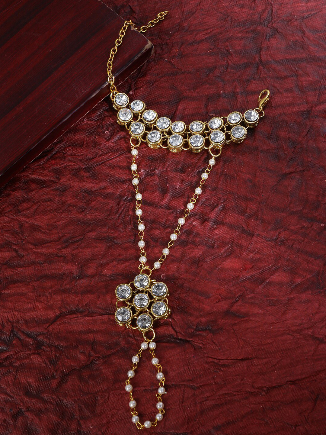 

LIVE EVIL Women Gold-Toned & White Kundan Gold-Plated Ring Bracelet