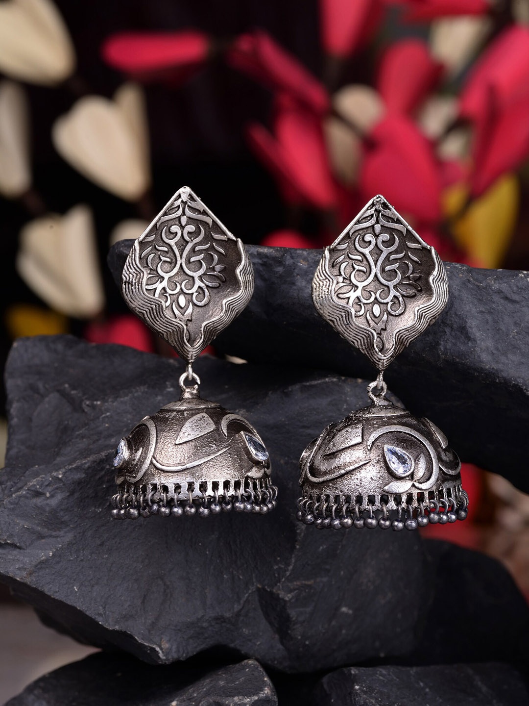 

Saraf RS Jewellery Silver-Toned Dome Shaped Jhumkas Earrings